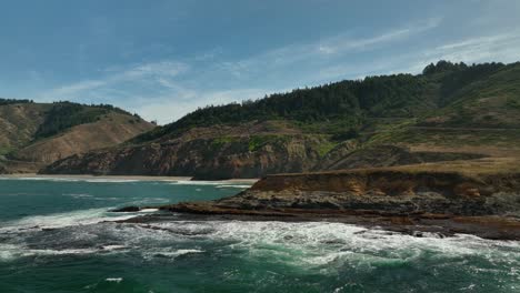 Drone-establishing-shot-of-Northern-California's-beautiful-coastline-during-the-summer