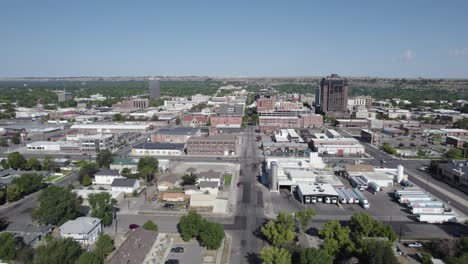 city buildings on summer day in billings, montana - establishing aerial drone