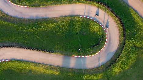 aerial view of go-kart racing track in smiltene, latvia in golden hour