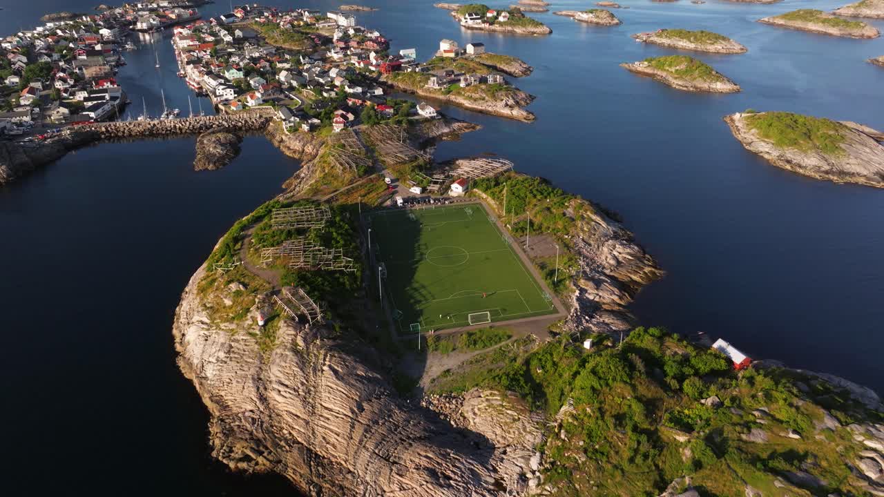 Establishing Drone Shot Above Henningsvaer Football Stadium. Lofoten Islands, Norway. Summer