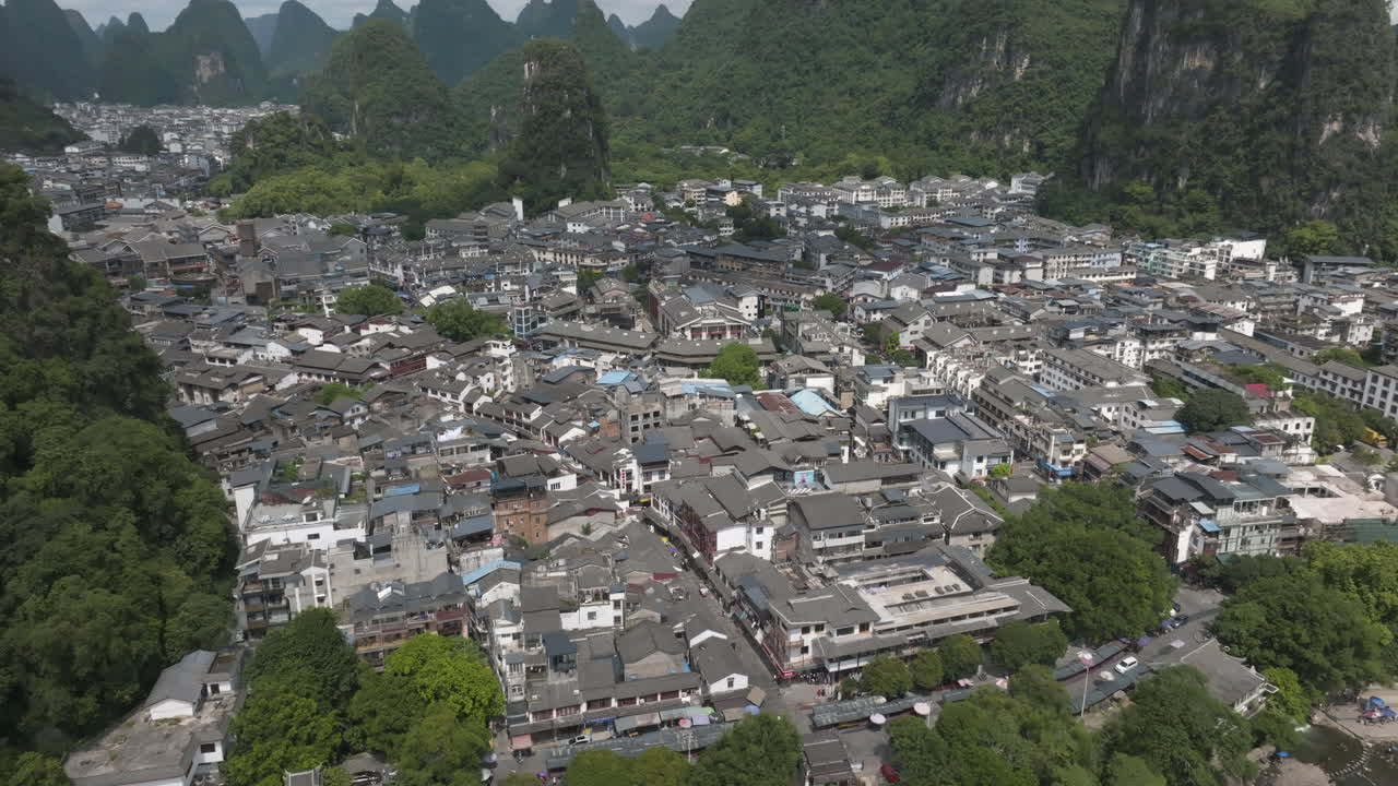 Aerial view circling the Yangshou village, sunny, summer day in Guangxi, China