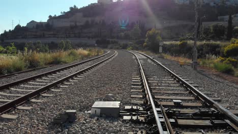 train tracks winding through a landscape