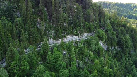 steep road leading up a mountain in the alps in lofer, austria