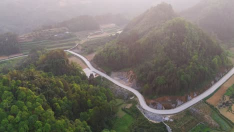 motorcycle cruising along scenic mountain roads in ha giang with river