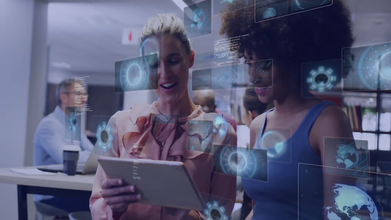 Two women collaborating on tablet with digital data processing animation overlay