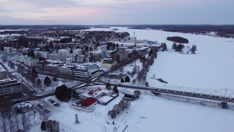 tornio city in winter landscape in pello, lapland, finland. aerial drone shot