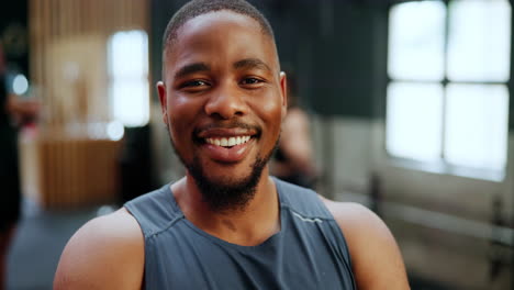 man smiling in a gym