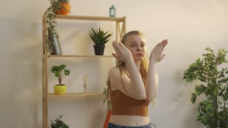 young woman dancing in a room