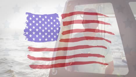 American-flag-design-pattern-against-caucasian-man-sitting-in-a-boat