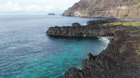 aerial view of beautiful coastline in the azores with volcanic beach