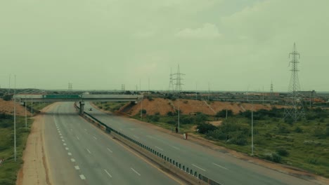 aerial view of karachi motorway with traffic approaching