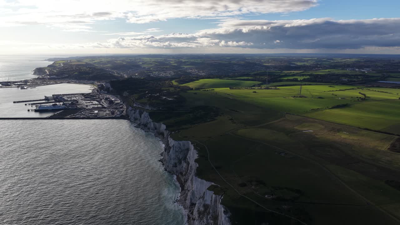 White limestone cliffs at the port of Dover, England. Aerial video at sunset