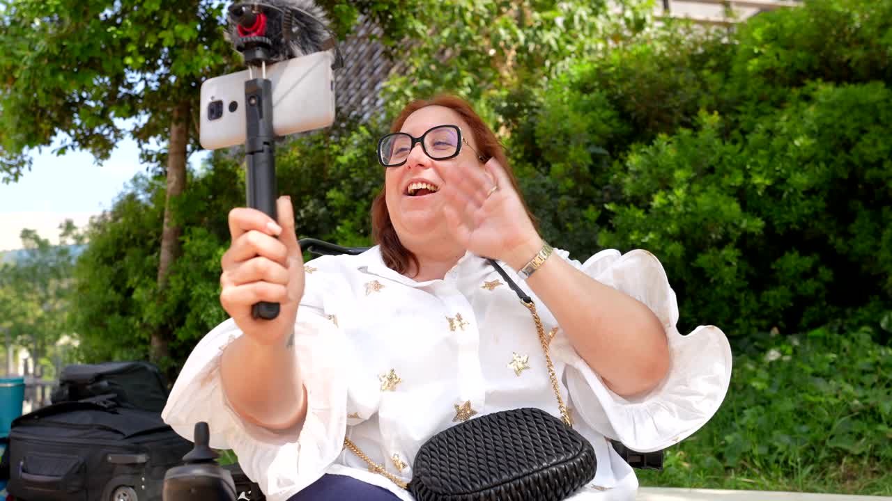 Woman Vlogging from a Wheelchair