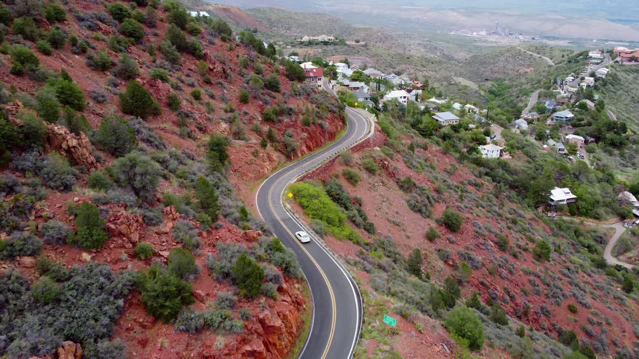 Car Passing "Entering Jerome" Sign on Twisty Highway AZ-89A