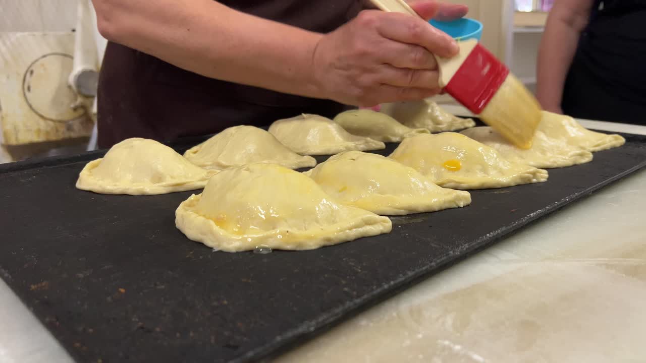 Bakery scene: elaboration of the traditional &ldquo;empanadillas&rdquo;