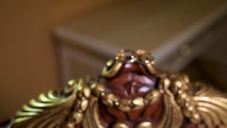 wedding rings on an ornate chair