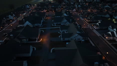 Aerial-truck-shot-of-dark-neighborhood-at-night