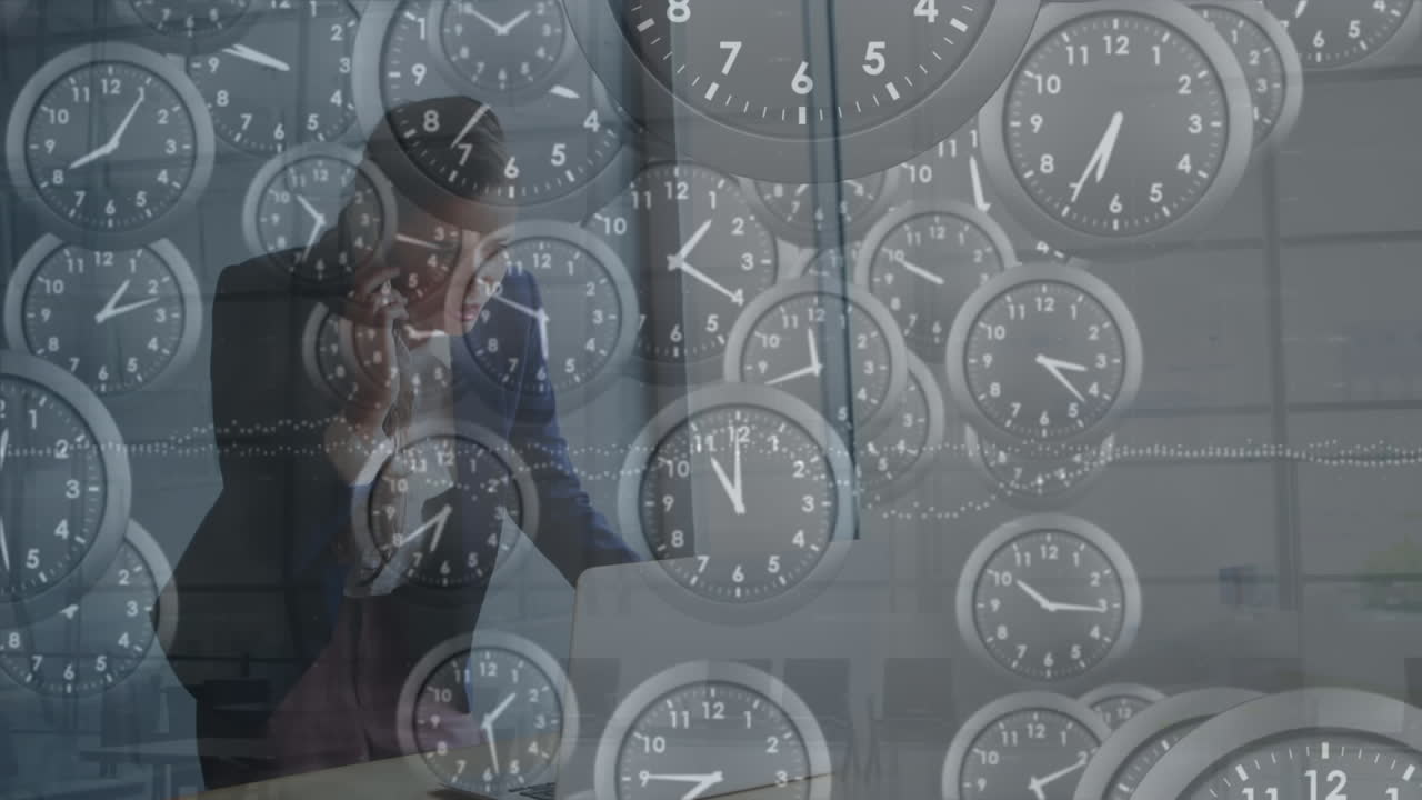 Animation of multiple ticking clocks against caucasian businesswoman talking on smartphone at office