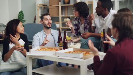 friends enjoying a pizza party at home