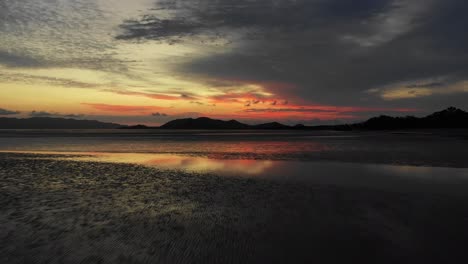 Low-flight-over-tropical-beach