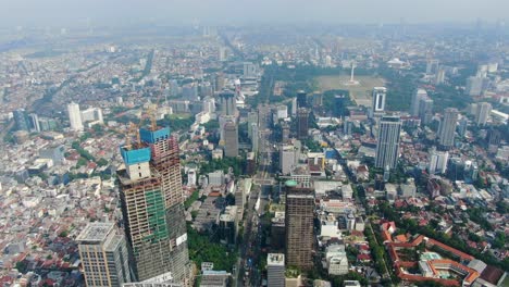 aerial forward over jakarta city, indonesia