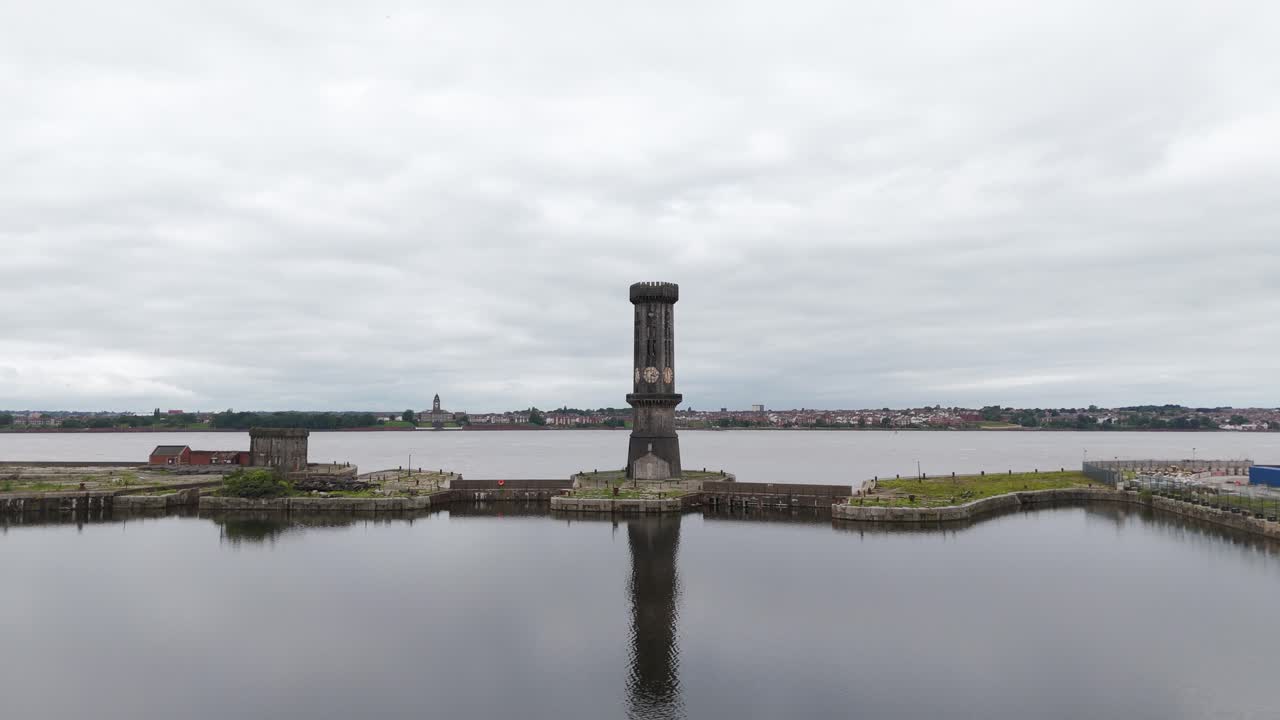 Victoria Tower at Salisbury Dock, Liverpool, UK. Aerial forward at low altitude, copy space