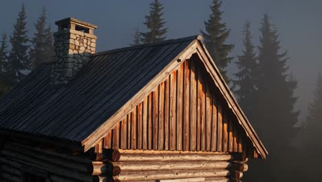 misty mountain cabin at sunrise