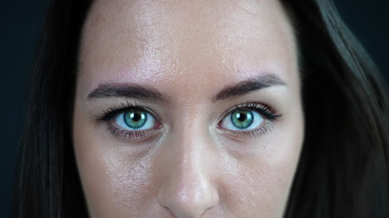 Portrait of Funny Young Woman With Facial Expressions, Surprised, Scared, Moving Green Eyes and Eyebrows, Close Up