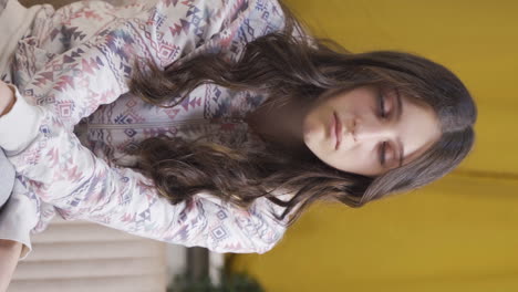 Vertical-video-of-Portrait-of-sad-young-woman-at-night-at-home.