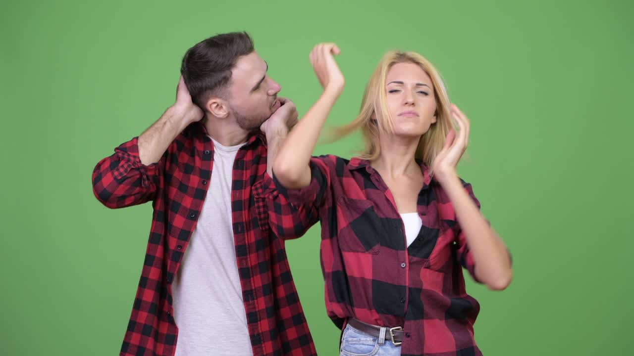 Young couple having neck pain together