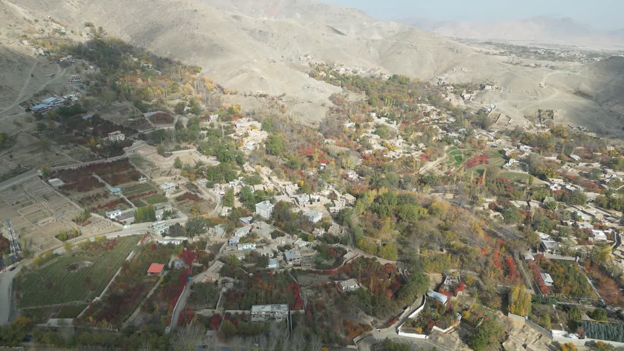 Aerial drone view of villages over Paghman region near Kabul, Afghanistan