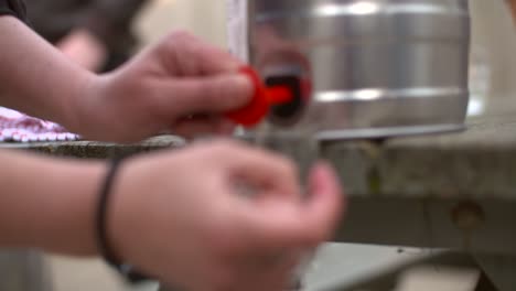 pouring a pint from keg