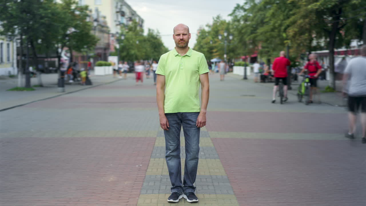 Man standing on a city street