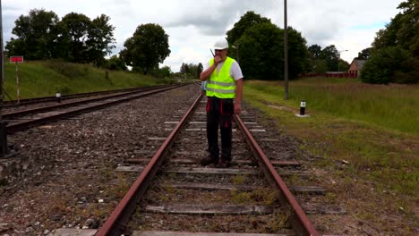 railway staff checks railway condition