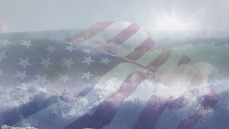 digital composition of waving us flag against waves in the sea