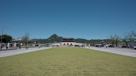 Gwanghwamun-Gate---gateway-to-Gyeongbokgung-Palace,-Seoul-city-Gwanghwamun-Plaza-rebuilt-in-2022---extreme-wide-angle-view-copy-space