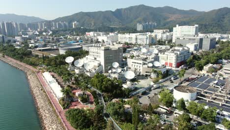 Cluster-of-Satellite-broadcast-Dishes-on-Hong-Kong,-Aerial-view