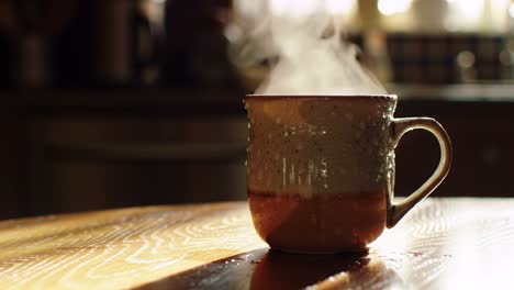 hot coffee in a mug on a sunny morning