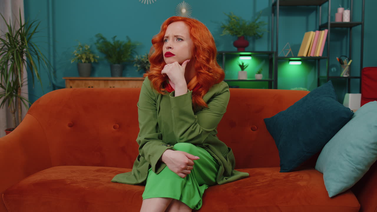Thoughtful inspired redhead young woman make Eureka gesture raises finger came up with creative plan