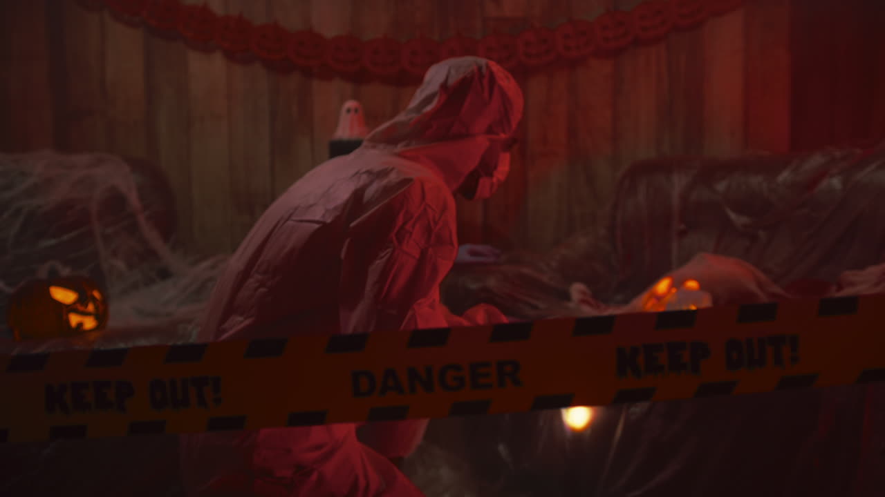 Forensic Police Search Crime Scene With Flashlight on Halloween Night Pumpkins