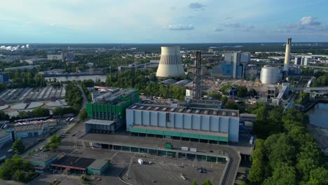 waste incineration plant, waste to new energy sources, polluting the atmosphere and contributing to climate change. beautiful aerial view flight descending drone