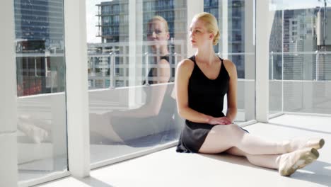 Ballerina-relaxing-in-studio