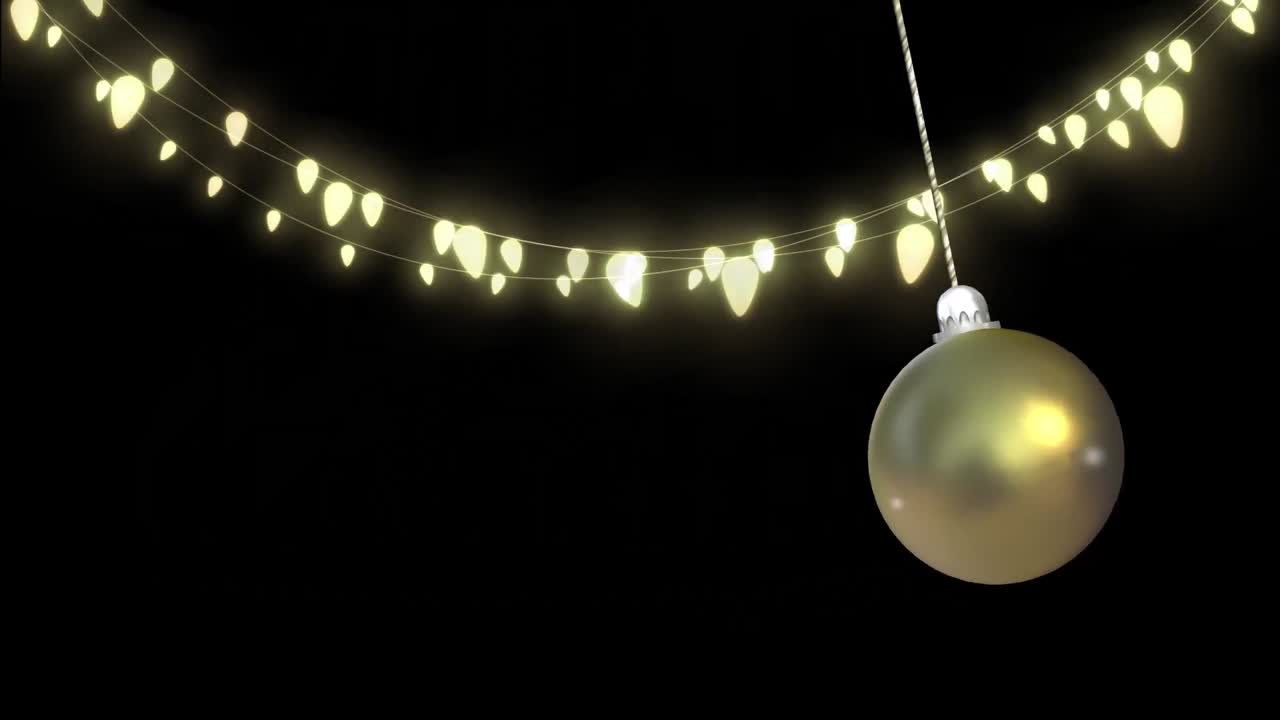 animación de la joya de navidad colgando sobre las luces de hadas en fondo negro.
