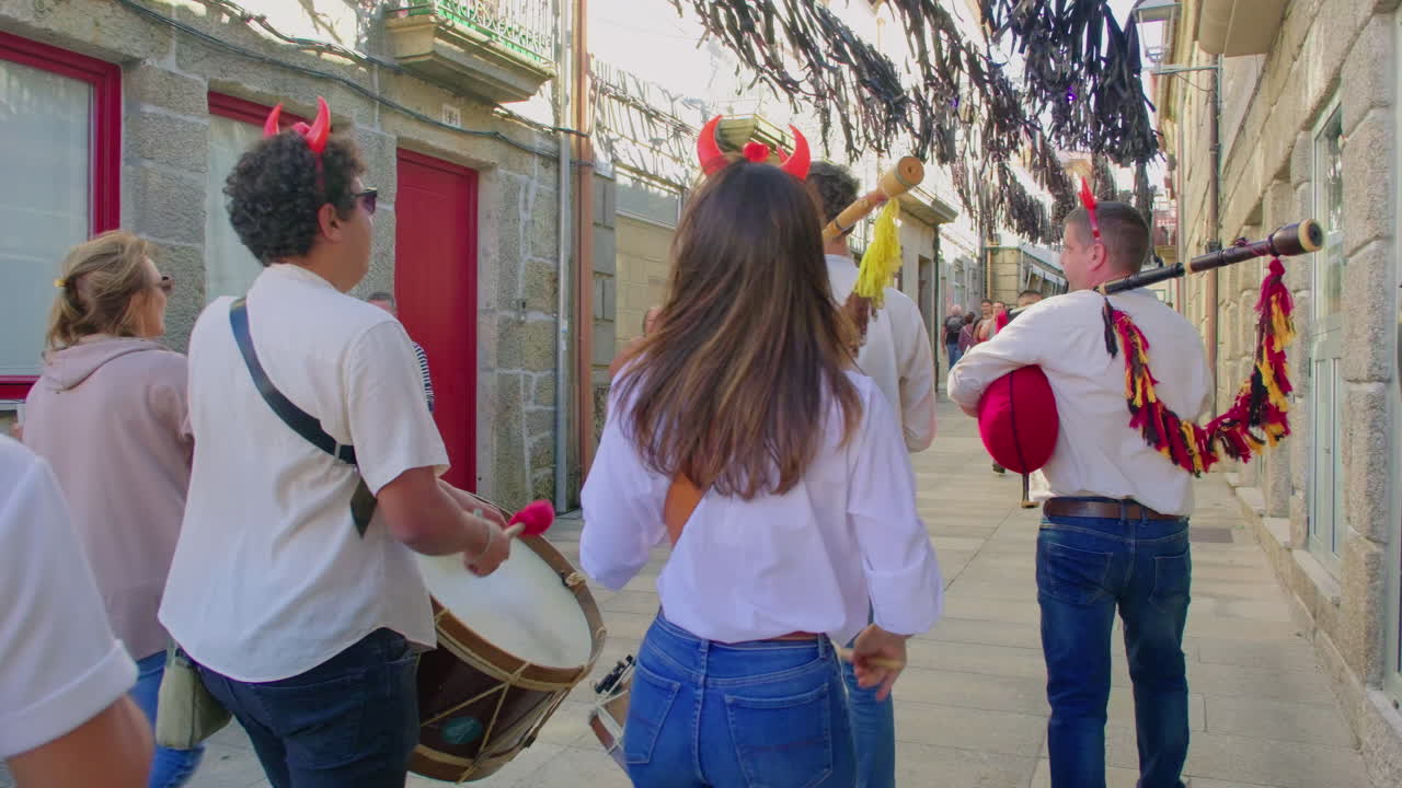 montalegre 13 september 2024 friday the 13th group of musicians walking the avenue