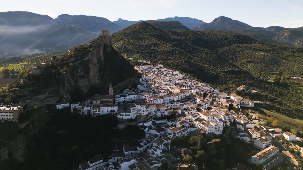 Aerial Drone over the Zahara de la Sierra, Spain. Castle overlooks town.