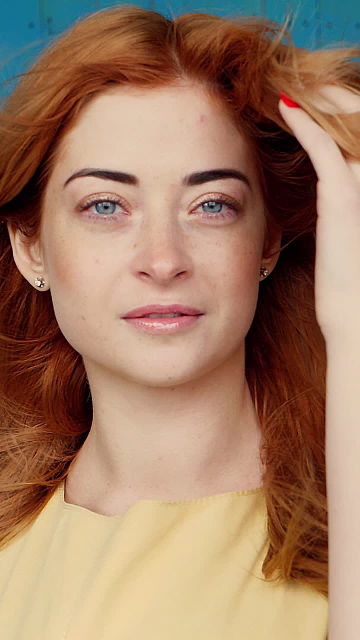 Portrait of a woman with red hair