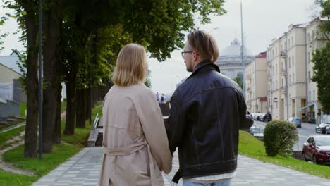 couple walking in the city park