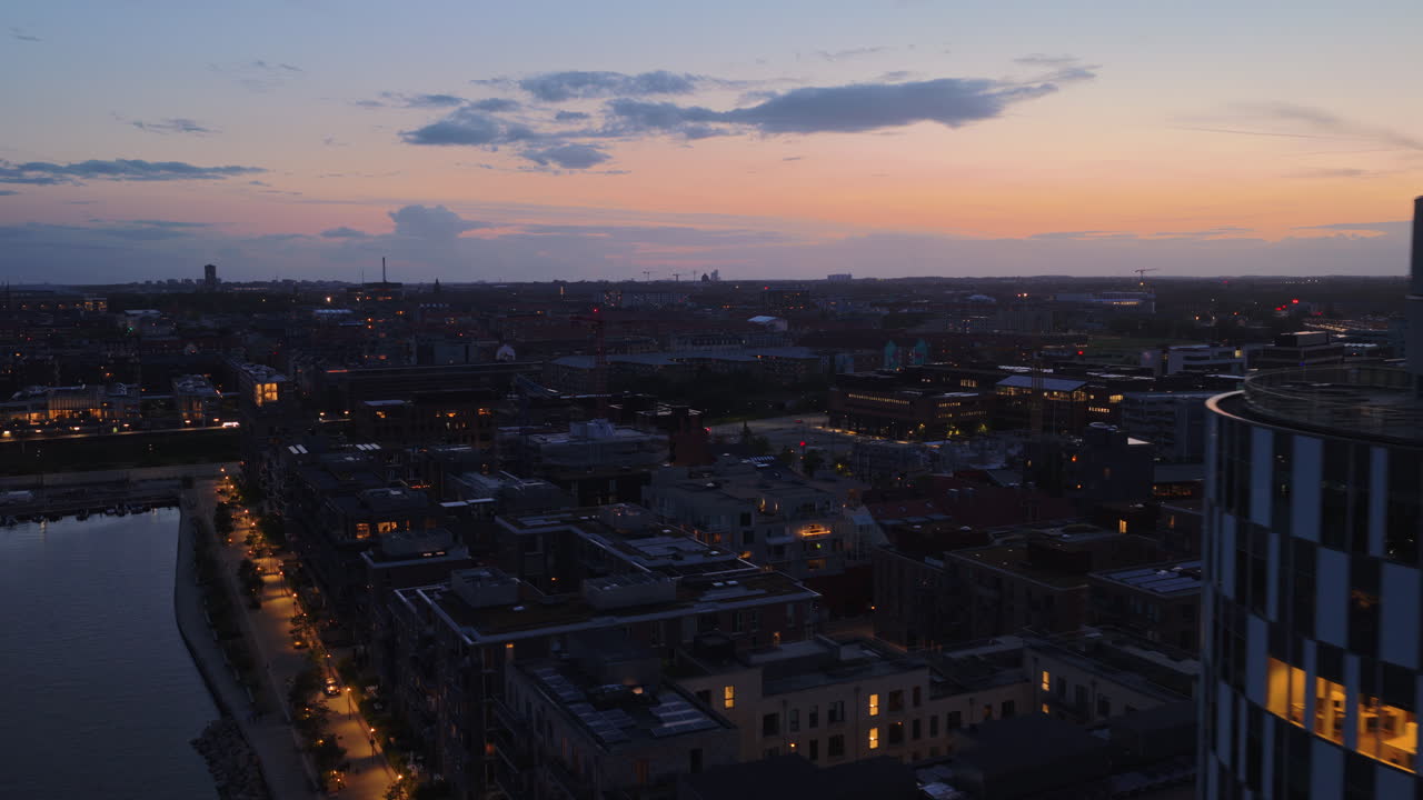 Aerial drone view of the Axel Towers, modern round glass buildings in Copenhagen, Denmark