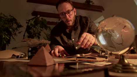 focused man at antique desk
