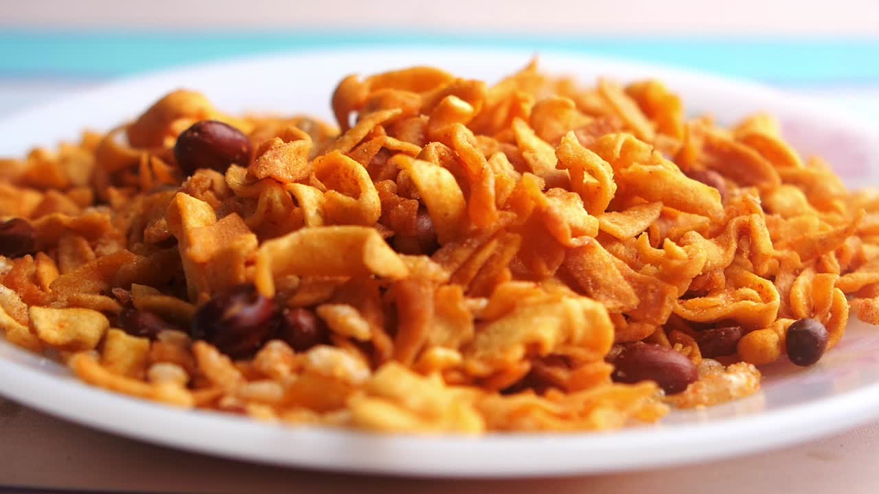 Indian Savory Snack Mixture (Namkeen/Chivda) on a Plate